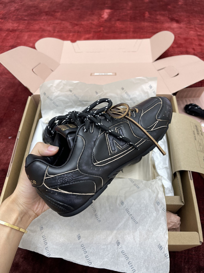 new Ba1an*e x m1um1u sneaker